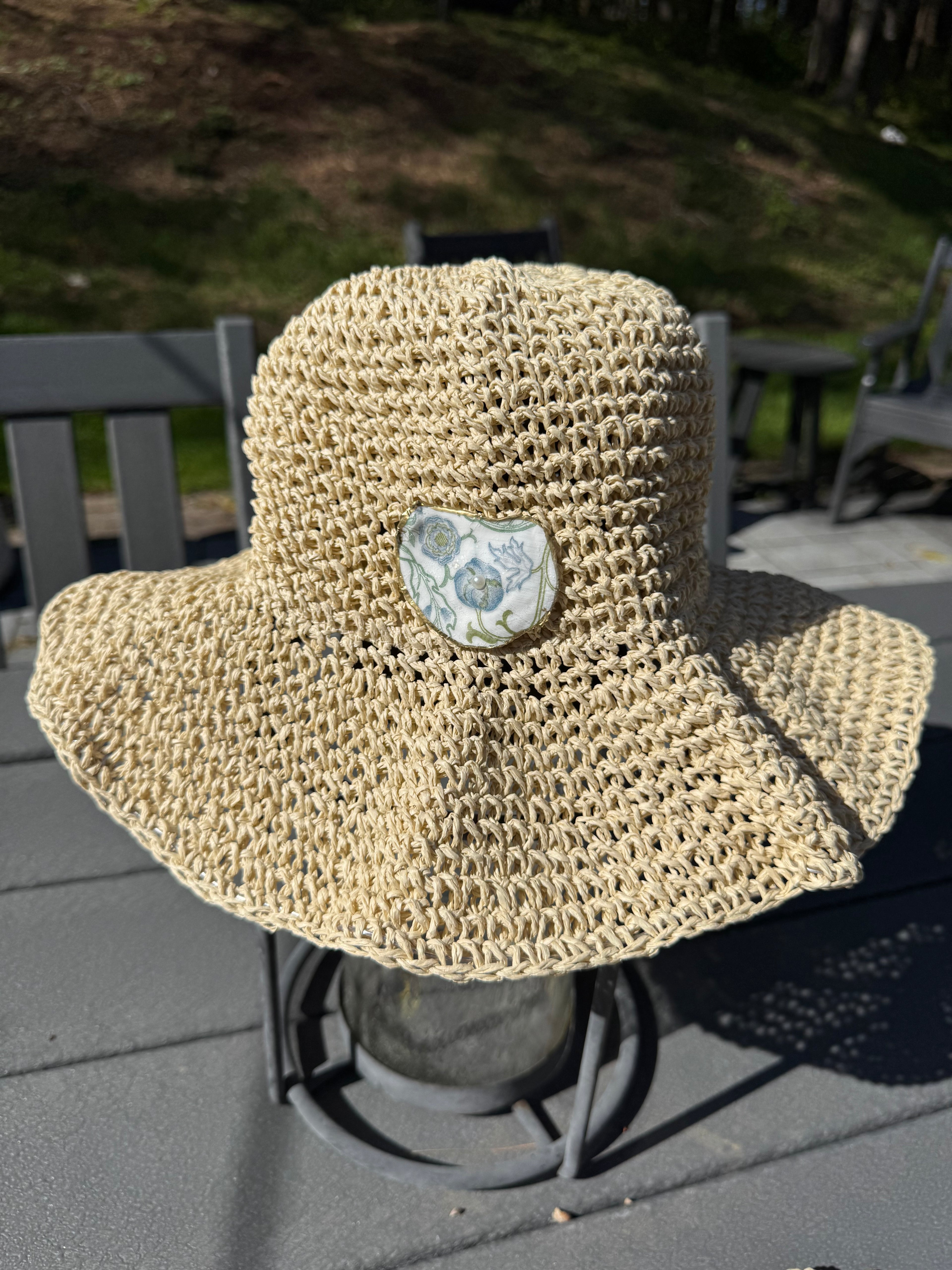 Straw Hat with Oyster Embellishment