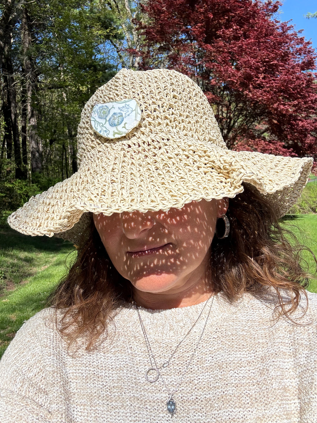Straw Hat with Oyster Embellishment